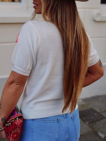 Haut en tricot à manches courtes pour femmes avec appliques de fleurs