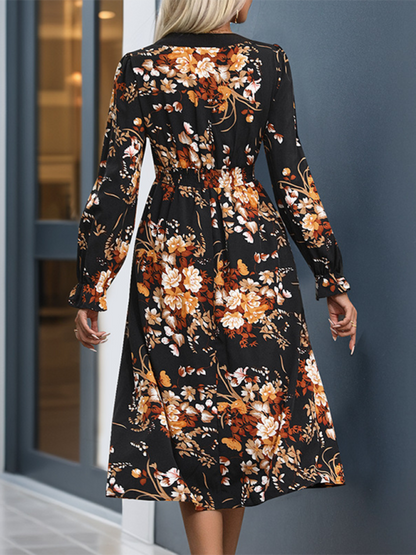 Robe mi-longue fleurie et vibrante pour l'automne