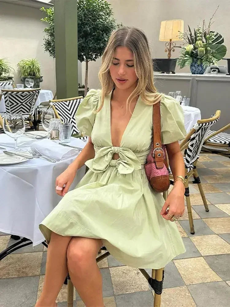 Mini Dresses- Dual Bow Knot Plunging Neck Pleated Skirts Puff Sleeves Mini Dress