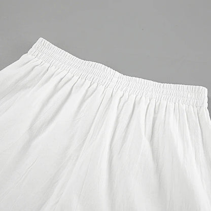 Ensemble haut licou blanc à nouer et short doublé pour femme