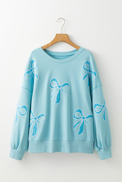 Sweatshirts & Hoodies - Oversized Sweatshirt with Sequined Bows