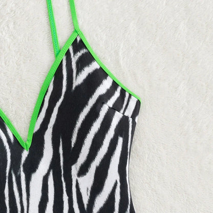 Swimwear- Zebra Print Plunging One-Piece Swimwear for Women with Vibrant Green Binding- - Pekosa Women Fashion