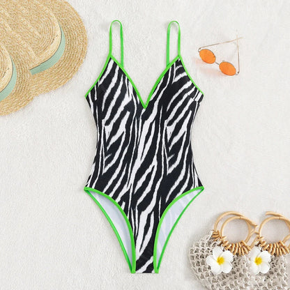 Swimwear- Zebra Print Plunging One-Piece Swimwear for Women with Vibrant Green Binding- Black- Pekosa Women Fashion